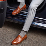 Elegant vintage brown men's loafer in woven leather
