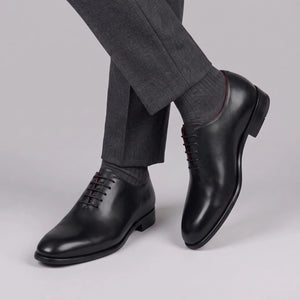 Men's elegant blue wholecut oxford in leather and red lining in just €189.99